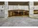 Parking garage entrance with speed bumps and industrial lighting, convenient resident parking at 3235 Roswell Ne Rd # 508, Atlanta, GA 30305