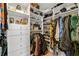 Custom walk-in closet with ample storage, shelving, drawers, and rods for organized living at 3235 Roswell Ne Rd # 508, Atlanta, GA 30305