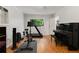Large bonus room with laminate floor, exercise equipment and natural light at 553 Collingwood Dr, Decatur, GA 30032