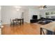Open-concept living room featuring hardwood floors and comfortable seating at 553 Collingwood Dr, Decatur, GA 30032