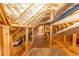 Unfinished attic shows wooden framing, insulation, and ductwork with potential for storage or expansion at 100 Marshas Vineyard, Hampton, GA 30228