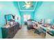Bedroom includes wood floors, vaulted ceilings, a ceiling fan, and a desk at 100 Marshas Vineyard, Hampton, GA 30228
