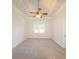 Bedroom featuring a ceiling fan and carpeted floor at 100 Marshas Vineyard, Hampton, GA 30228