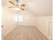 Bright bedroom with carpeted floor, ceiling fan, and a window at 100 Marshas Vineyard, Hampton, GA 30228