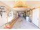Well-organized garage featuring open storage, a loft, and ample room for projects and equipment at 100 Marshas Vineyard, Hampton, GA 30228