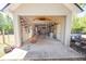 Spacious garage showcases organized storage, a loft area accessed by a ladder, and ample workspace at 100 Marshas Vineyard, Hampton, GA 30228