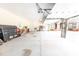 Well-lit, expansive garage with multiple bays, providing ample parking and storage options at 100 Marshas Vineyard, Hampton, GA 30228