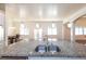 Kitchen island featuring double sinks and granite counter tops at 100 Marshas Vineyard, Hampton, GA 30228