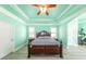 Main bedroom with a tray ceiling, ceiling fan, and light-colored walls at 100 Marshas Vineyard, Hampton, GA 30228