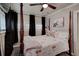 Bedroom with four-poster bed and floral bedding at 3116 Jackson St, Hapeville, GA 30354