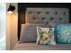 Cozy bedroom with decorative pillows and padded headboard at 3116 Jackson St, Hapeville, GA 30354