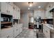 Stylish kitchen with custom cabinetry, stainless steel appliances, and modern tiled flooring at 3116 Jackson St, Hapeville, GA 30354