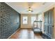 Bonus room featuring exposed brick wall and a doorway to the exterior at 3553 Lakeview Dr, Rex, GA 30273