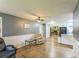 Open-concept living room with hardwood floors, neutral paint, and great natural light, perfect for relaxation at 3553 Lakeview Dr, Rex, GA 30273