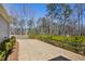 Spacious backyard featuring a wooden fence and lush green shrubbery at 3891 Shelleydale Dr, Powder Springs, GA 30127