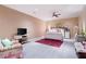 Bedroom featuring a comfortable bed, a ceiling fan, and stylish furnishings at 7131 Ridge Rd, Hiram, GA 30141