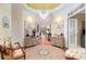 Inviting foyer with hardwood floors, a chandelier, and views into adjacent living spaces at 7131 Ridge Rd, Hiram, GA 30141