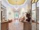 Grand foyer with tile flooring, elegant chandelier, and bright natural light at 7131 Ridge Rd, Hiram, GA 30141