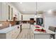 Spacious kitchen boasts custom cabinets, marble countertops, and stainless steel appliances at 7131 Ridge Rd, Hiram, GA 30141