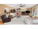 Open-concept living room showcasing a fireplace, coffered ceilings, and plenty of seating at 7131 Ridge Rd, Hiram, GA 30141