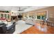 Bright and airy living room with large windows, a fireplace, and a coffered ceiling at 7131 Ridge Rd, Hiram, GA 30141