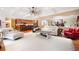 Spacious living room with hardwood floors, ceiling fan, and an open floor plan to the kitchen at 7131 Ridge Rd, Hiram, GA 30141