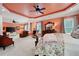 Spacious main bedroom boasts a sitting area, ceiling fan, and tranquil ambiance at 7131 Ridge Rd, Hiram, GA 30141