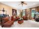 Home office featuring two windows, carpeted floors, seating, decorative art and neutral colored walls at 7131 Ridge Rd, Hiram, GA 30141