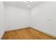 Bright bedroom features hardwood floors, white walls, and recessed lighting at 1129 Victory Sw Dr, Atlanta, GA 30310