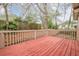 Back deck with a partial view of the lawn and a wooden fence at 134 N Alexander St, Buford, GA 30518