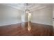 Spacious living room showcases hardwood floors, recessed lighting, modern light fixture, and neutral wall color at 134 N Alexander St, Buford, GA 30518