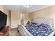 Bedroom with carpeted flooring, ensuite bathroom, and natural light at 2996 Jonesboro Road Southeast Se Rd # J, Atlanta, GA 30354