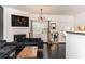 Spacious living room with a fireplace, dark wood flooring, and ample natural light at 2996 Jonesboro Road Southeast Se Rd # J, Atlanta, GA 30354