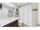 Bathroom with a vanity, toilet and shower with white shower curtain at 3504 Castleberry Village Cir # 36, Cumming, GA 30040