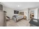 Bright and stylish bedroom with a comfy bed, neutral walls, and view into the hall at 3504 Castleberry Village Cir # 36, Cumming, GA 30040