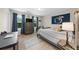 Bedroom featuring natural light, calming blue tones, and modern furnishings at 3504 Castleberry Village Cir # 36, Cumming, GA 30040