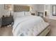 Comfortable bedroom with plush carpeting, tufted headboard, and neutral tones create a relaxing atmosphere at 3504 Castleberry Village Cir # 36, Cumming, GA 30040