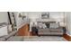 Comfortable living room with hardwood floors, cozy seating, and stylish decor accents at 3504 Castleberry Village Cir # 36, Cumming, GA 30040