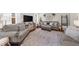 Spacious living room featuring comfortable seating, a large rug and plenty of natural light at 3504 Castleberry Village Cir # 36, Cumming, GA 30040