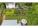 An aerial view of the meticulously landscaped backyard, complete with a custom seating area and shed at 797 Ashland Ne Ave, Atlanta, GA 30307