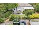 Inviting backyard with an outdoor seating area, patio, and a lush garden at 797 Ashland Ne Ave, Atlanta, GA 30307