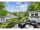Charming backyard featuring a dining area, bar, seating area, and landscaped garden at 797 Ashland Ne Ave, Atlanta, GA 30307