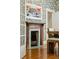 Charming dining room fireplace with blue tile surround, adding warmth and character to the space at 797 Ashland Ne Ave, Atlanta, GA 30307