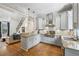 Bright kitchen open to the living room features granite counters, stainless appliances, and lots of light at 797 Ashland Ne Ave, Atlanta, GA 30307