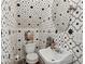 Chic powder room with patterned wallpaper, stylish fixtures, and a modern sink at 797 Ashland Ne Ave, Atlanta, GA 30307