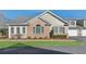 Charming single-story brick home with manicured lawn and attached two-car garage at 2565 Grapevine Cir # 103, Cumming, GA 30041