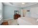 Calming main bedroom with neutral tones, ceiling fan and natural light at 2565 Grapevine Cir # 103, Cumming, GA 30041