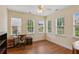 Bright office space featuring hardwood floors, three windows, and natural light at 2565 Grapevine Cir # 103, Cumming, GA 30041