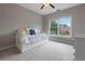 Bedroom featuring a trundle bed and a large window overlooking the neighborhood at 290 Bluff Oak Dr, Roswell, GA 30076