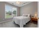Cozy bedroom with natural light and side table at 290 Bluff Oak Dr, Roswell, GA 30076